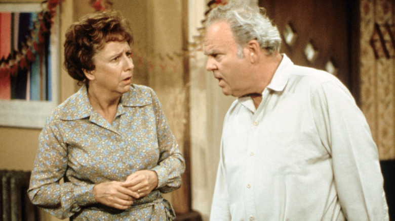 Archie Bunker (Carroll O'Connor) and Sally Struthers (Edith Bunker) talking in All in the Family
