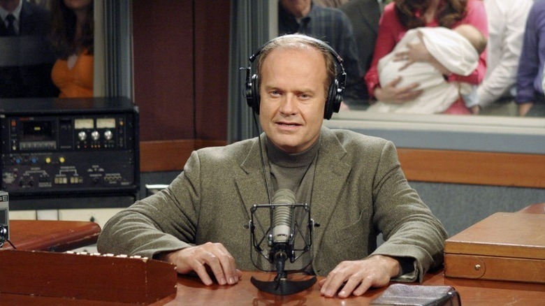 Kelsey Grammer as Frasier Crane hosting radio show in Frasier