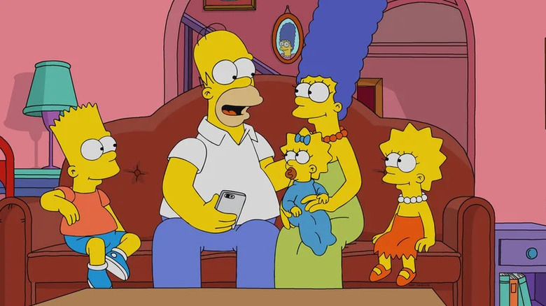 The Simpson family sitting on the couch in The Simpsons
