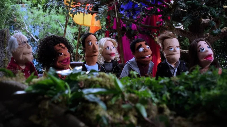 Muppet versions of the main cast sit in forest set in Community