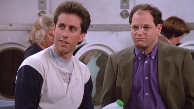 Jerry Seinfeld and George Costanza (Jason Alexander) sit in a laundromat in Seinfeld