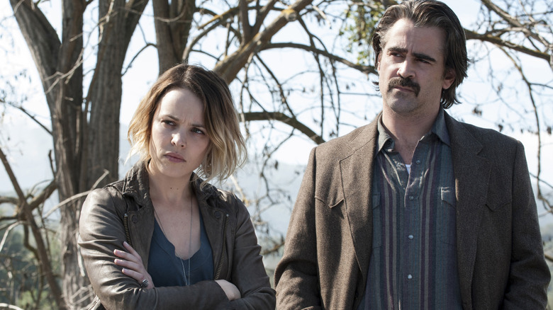 Ray Velcoro (Colin Farrell) and Ani Bezzerides (Rachel McAdams) standing together in True Detective