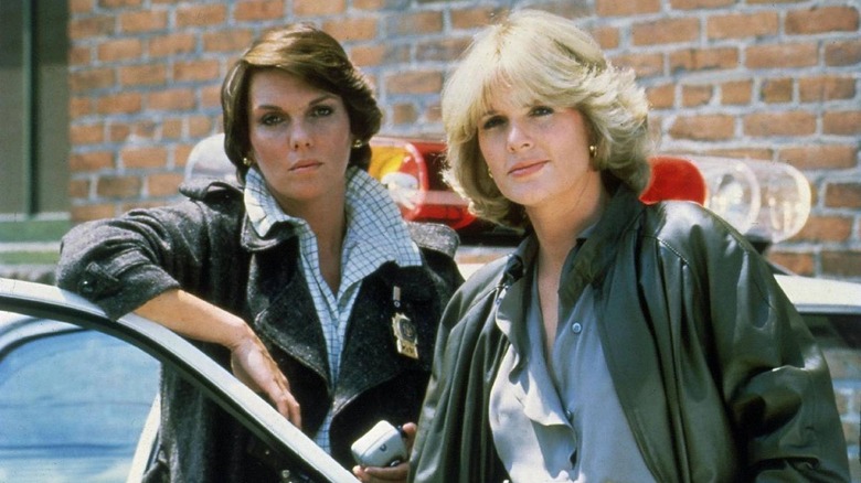 Cagney and Lacey standing next to each other on "Cagney & Lacey"