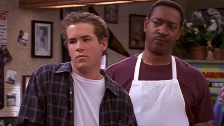 Berg (Ryan Reynolds) looks nonplussed with Bill (Julius Carry) in Two Guys and a Girl