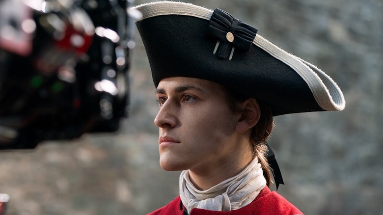 Finley Glasgow in a behind-the-scenes photo from Outlander: Blood of My Blood