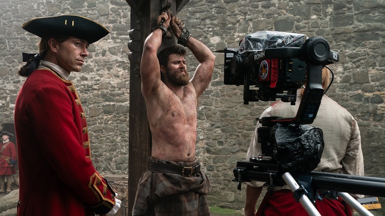 Digby Edgely and Sam Retford in a behind-the-scenes photo from Outlander: Blood of My Blood