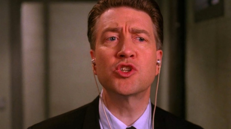 Gordon Cole wearing a listening device on Twin Peaks