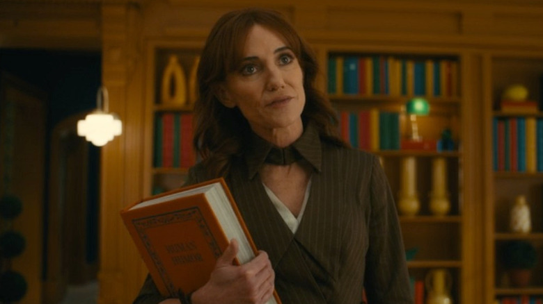 F.R.I.D.A.Y. holding book and tilting head in "VisionQuest"