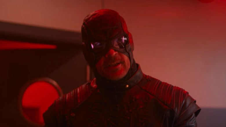 Paladin under red light in "VisionQuest"