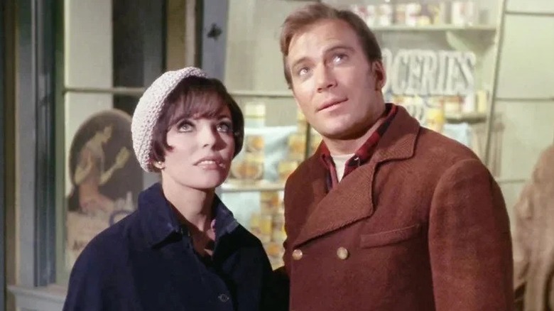 Edith and Kirk looking towards the sky in "The City on the Edge of Forever"