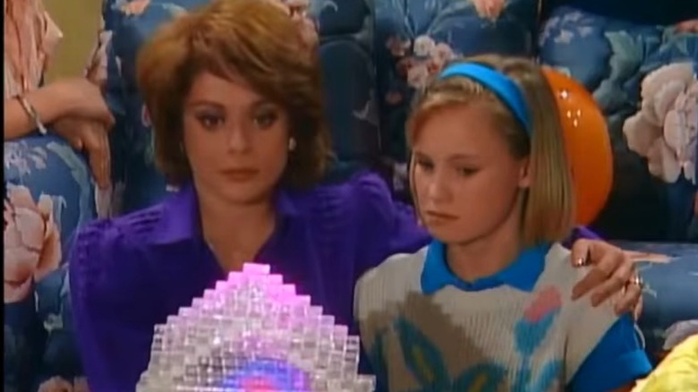 Out of this World pilot mom and daughter looking at crystal