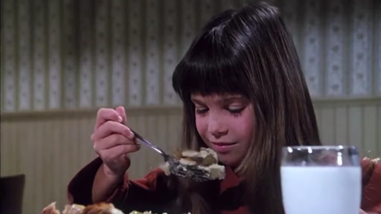 Carrie, played by either of the identical twins Lindsay or Sidney Greenbush, gets annoyed by her food on Little House on the Prairie.