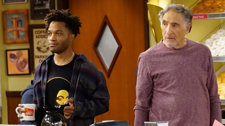 Jermaine Fowler as Franco and Judd Hirsch as Arthur on Superior Donuts, standing behind the counter