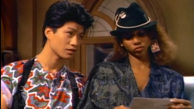 Officer Harry Truman Ioki looking confused and standing next to Judy Hoffs