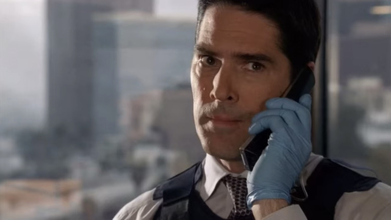 Aaron 'Hotch' Hotchner speaks on the phone in an episode of Criminal Minds.