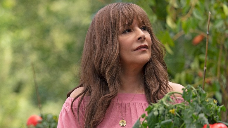 Deanna Troi (Marina Sirtis) stands in a garden on Star Trek: Picard