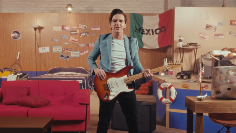 Drake Bell performing in the music video for I Kind of Relate