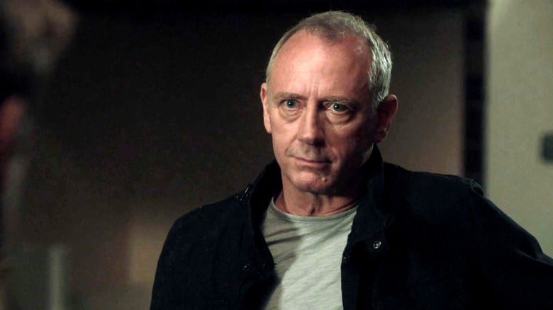 Thomas McAllister shows up in a T-shirt and black jacket to confront Patrick Jane in "The Mentalist" season six, episode eight.