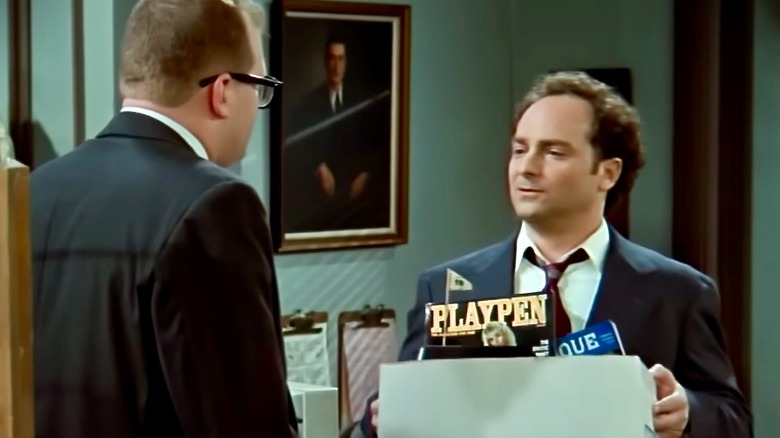 Mr. Bell leaving office with box full of personal belongings