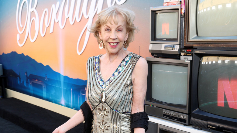 Nancy Daly posing on the 'The Boroughs' red carpet