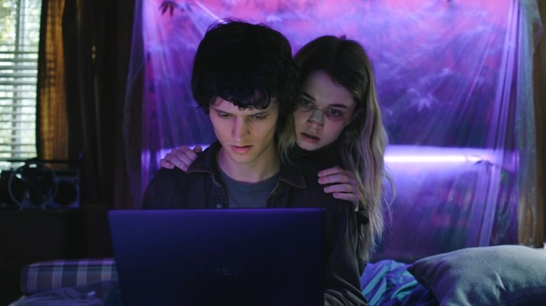 Chris and Billy look at some security footage in Carrie