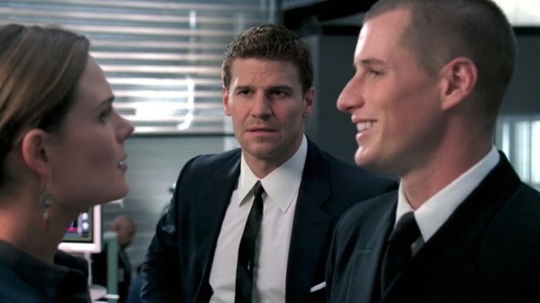 Emily Deschanel's Temperance Brennan and Brendan Fehr's Jared Booth talking while David Boreanaz's Seeley Booth watches on Bones