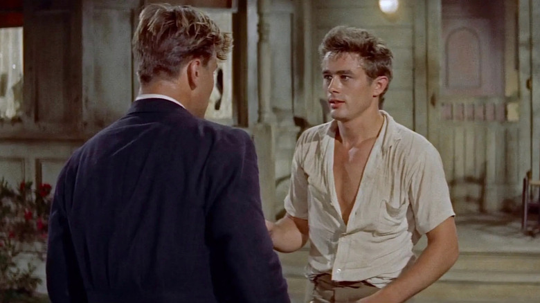 Caleb Trask talking to a man in a suit in 1955's "East of Eden"