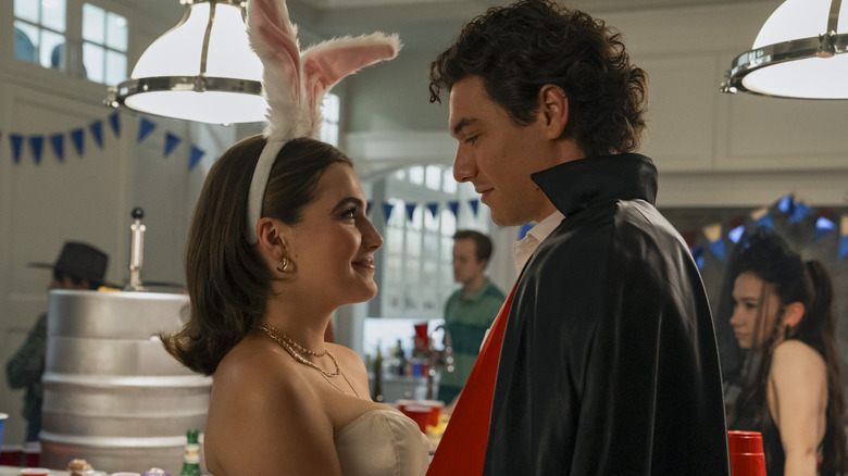 Hannah Wells in a bunny costume looking at Garrett Graham in a magician costume