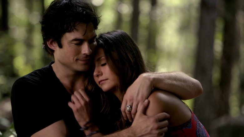 Ian Somerhalder's Damon embraces Nina Dobrev's Elena in The Vampire Diaries