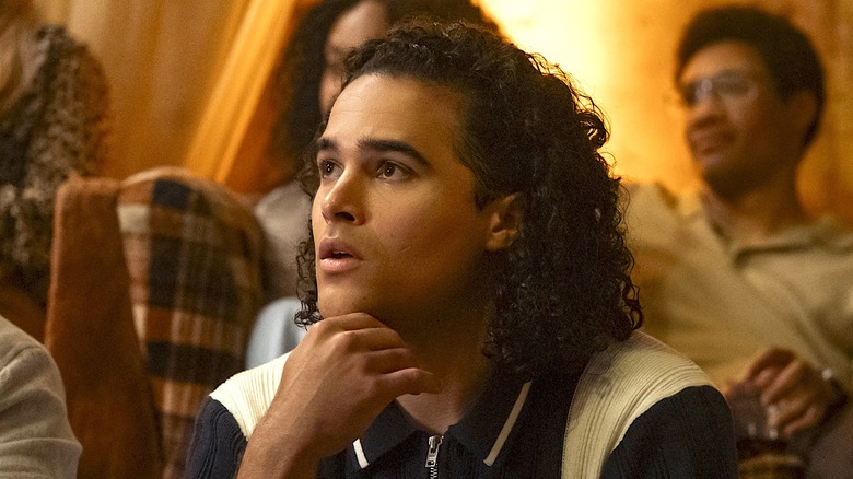 John Tucker looking pensive with his hand on his chin in "Off Campus"
