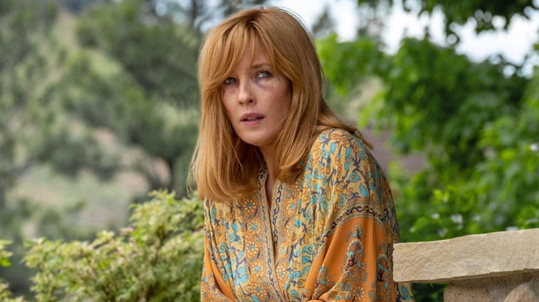 Beth Dutton sitting in a garden on Yellowstone
