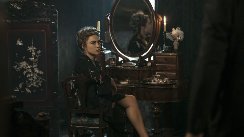 Cathy Ames sitting at a vanity desk in "East of Eden" (2026)