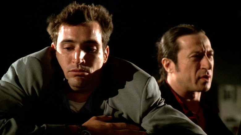 The Sopranos, Cousin Brian drunk and about to vomit with Furio behind him.