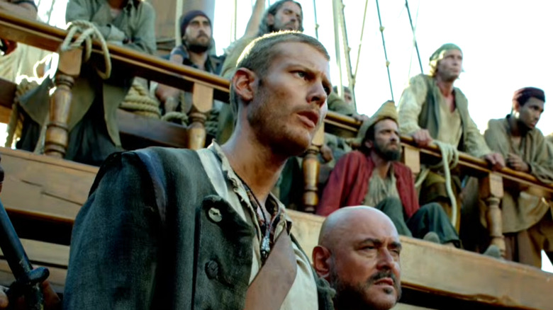 Tom Hopper as Billy Bones looking confused on deck of ship in Black Sails Season 1