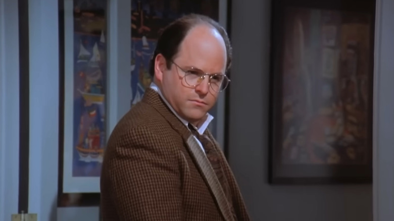 George finding Susan unconscious after she dies from the poison envelopes