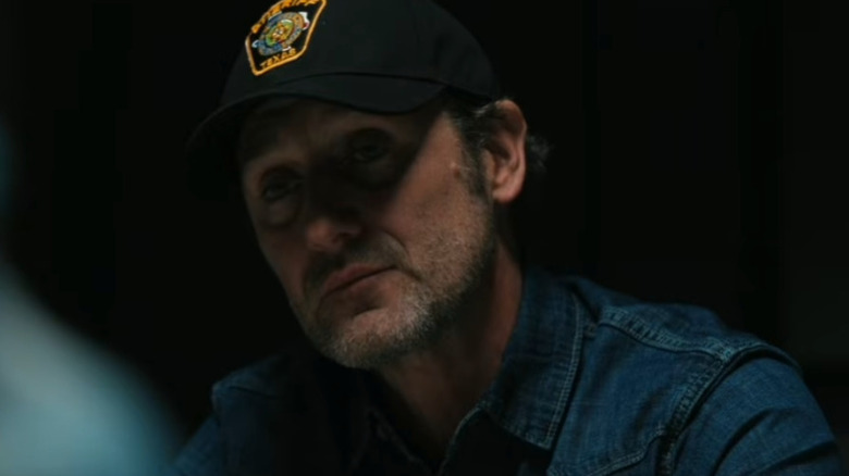 Sheriff Wade (Josh Stewart) sitting at an interrogation table on "Dutton Ranch."
