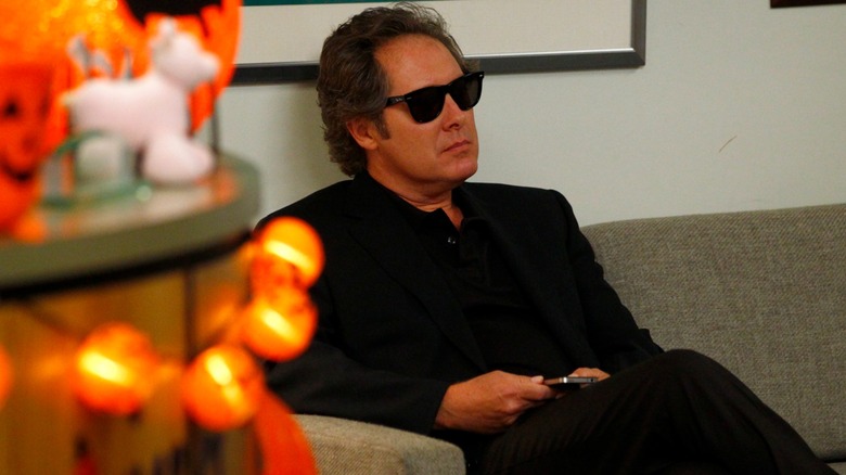 Robert California sitting at Halloween