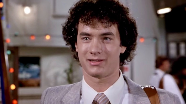 Rick Martin standing and smiling