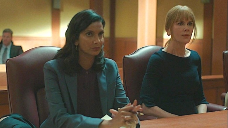 Katie Richmond sitting next to Celeste Wright in a courtroom in Big Little Lies