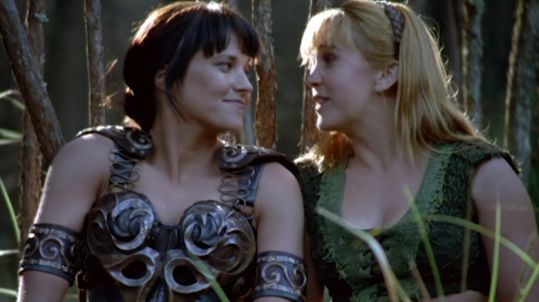 Xena and Gabrielle smiling and talking to each other