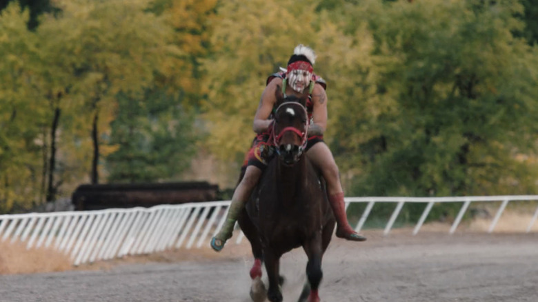 A Native American rider on horseback on Yellowstone
