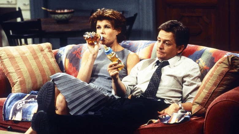 Connie Britton and Michael J. Fox in Spin City