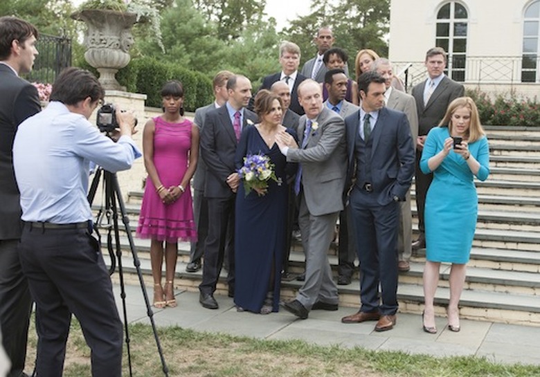Jonah helping organize the wedding photos