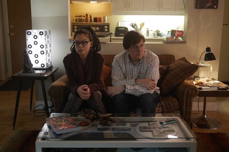 Cosima (TATIANA MASLANY) and Scott (JOSH VOKEY)