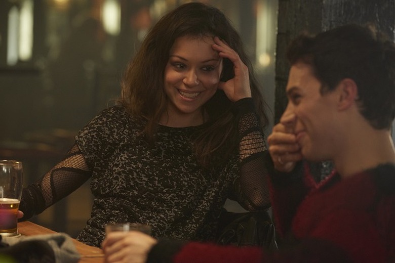 Sarah (TATIANA MASLANY) and Felix (JORDAN GAVARIS)