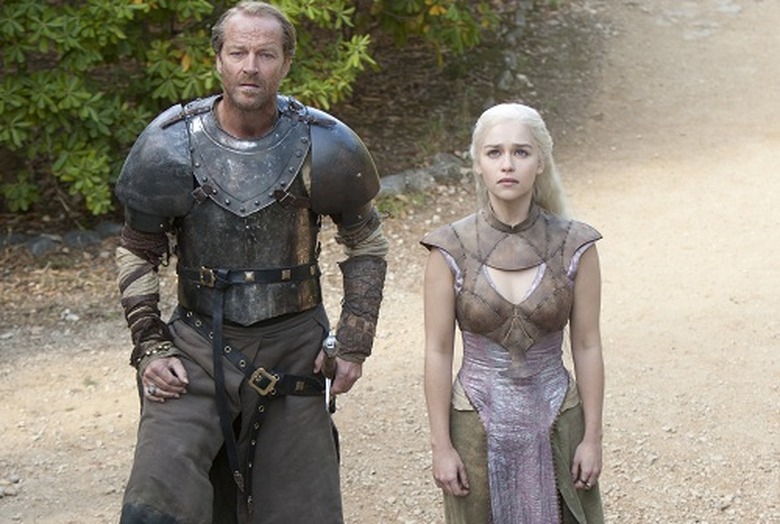 They climb steps to the tower above them