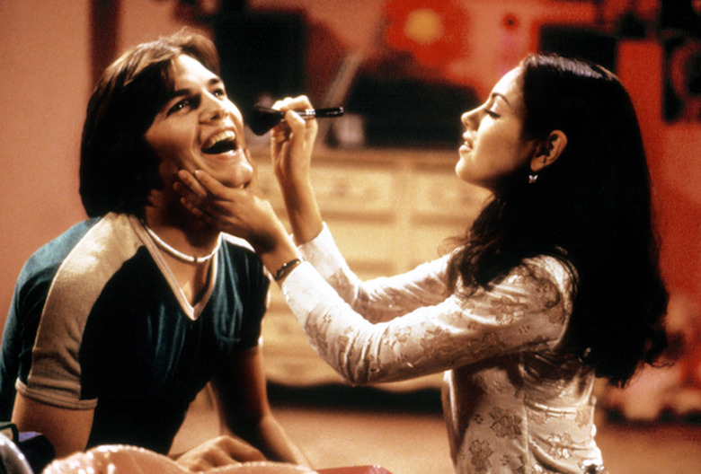 That '70s Show - Ashton Kutcher and Mila Kunis as Michael Kelso and Jackie Burkhart