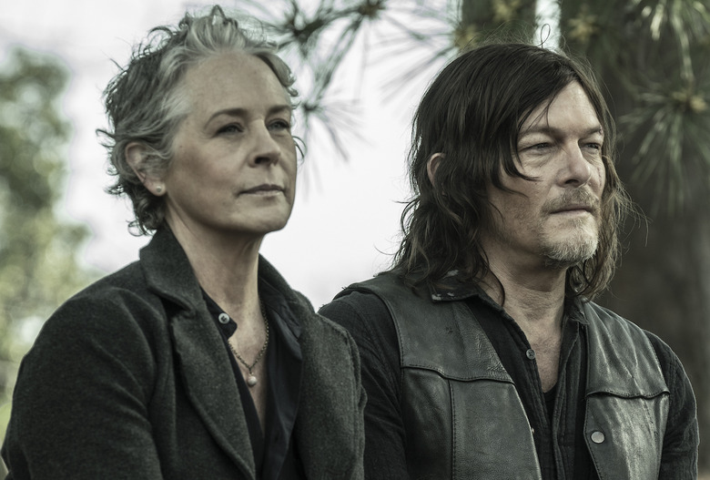 Norman Reedus as Daryl Dixon, Melissa McBride as Carol Peletier - The Walking Dead _ Season 11, Episode 24 - Photo Credit: Jace Downs/AMC