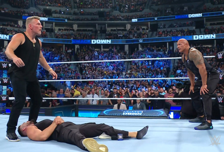 Pat McAfee with The Rock and Austin Theory on Friday Night Smackdown