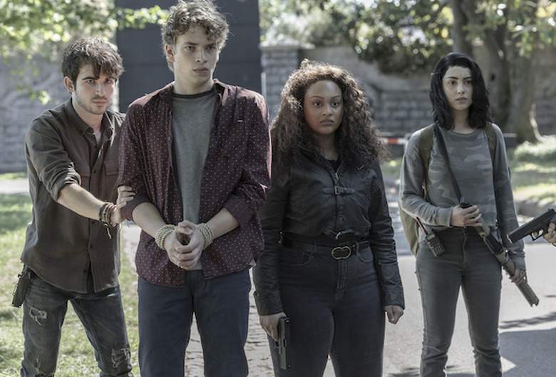 Ted Sutherland as Percy, Will Meyers as Mason, Aliyah Royale as Iris, Alexa Mansour as Hope - The Walking Dead: World Beyond _ Season 2, Episode 9 - Photo Credit: Steve Swisher/AMC
